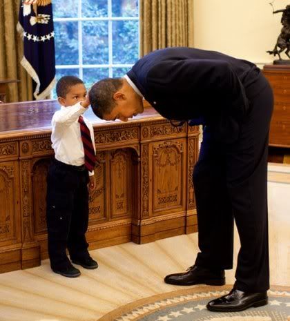 A young black boy was invited to the White House and asked President Obama 