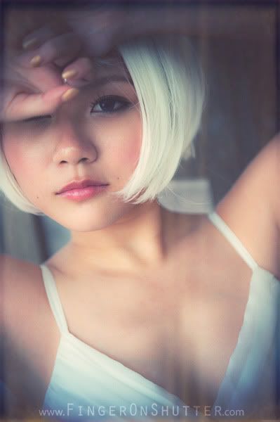 http://i575.photobucket.com/albums/ss200/shutterfingers/Model%20Photoshoot/Nicole%20Mok/Model%20Photos/07642445.jpg?t=1274872916