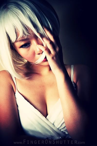 http://i575.photobucket.com/albums/ss200/shutterfingers/Model%20Photoshoot/Nicole%20Mok/Model%20Photos/1eaf8592.jpg?t=1274872912