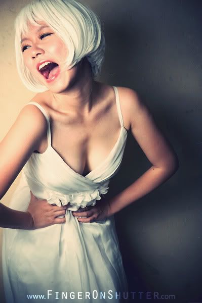 http://i575.photobucket.com/albums/ss200/shutterfingers/Model%20Photoshoot/Nicole%20Mok/Model%20Photos/98622375.jpg?t=1274872914